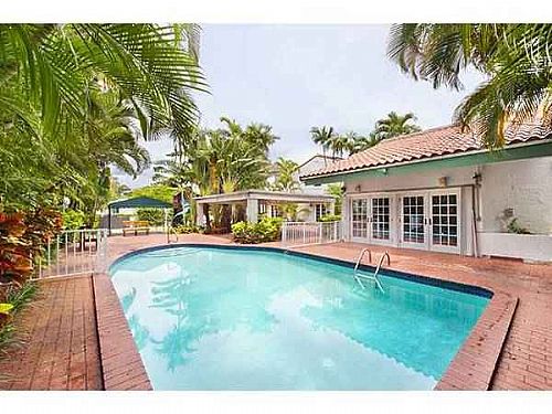 This is a very large main house (4/3) and guest house (3/3) on a huge 16K SF lot!
